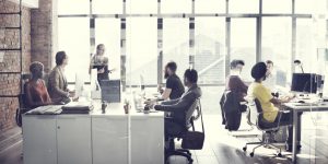 group of people working together in an office