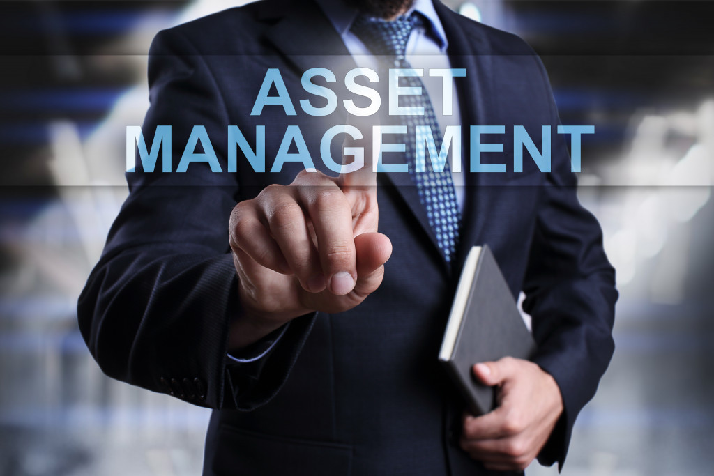 hand pointing to asset management
