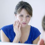a woman with toothache