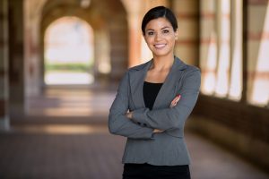 Woman in grey suit