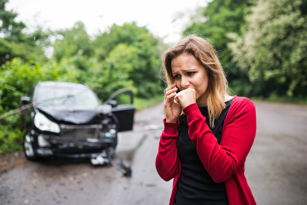 worried woman after a car accident
