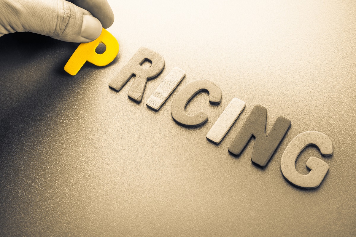Wood letters spelling the word PRICING